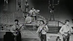 The Barbarians sing a medley of their hit.